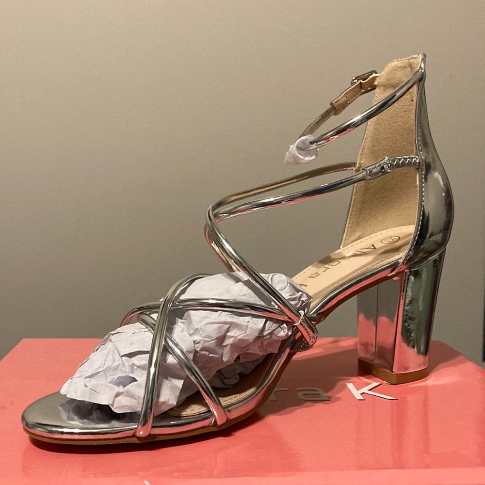 Brand new Allegra K heals. Size 7.5. Silver.